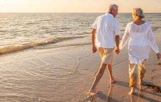 financial planning for retirement couple on beach