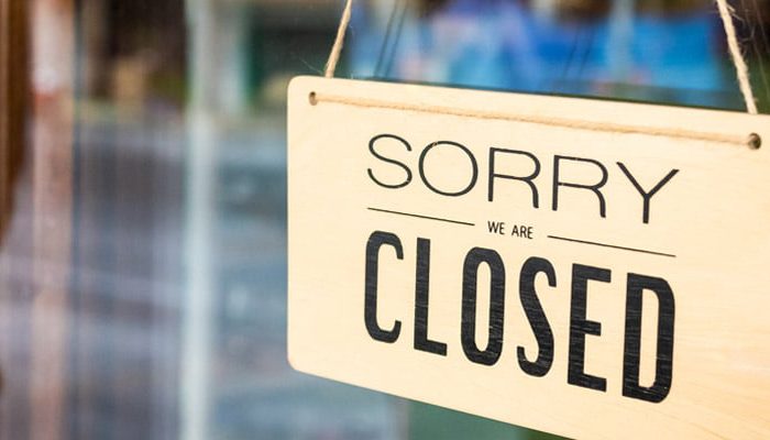 closed real estate sign