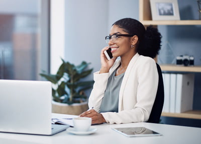 woman-on-phone-office woman in office on phone