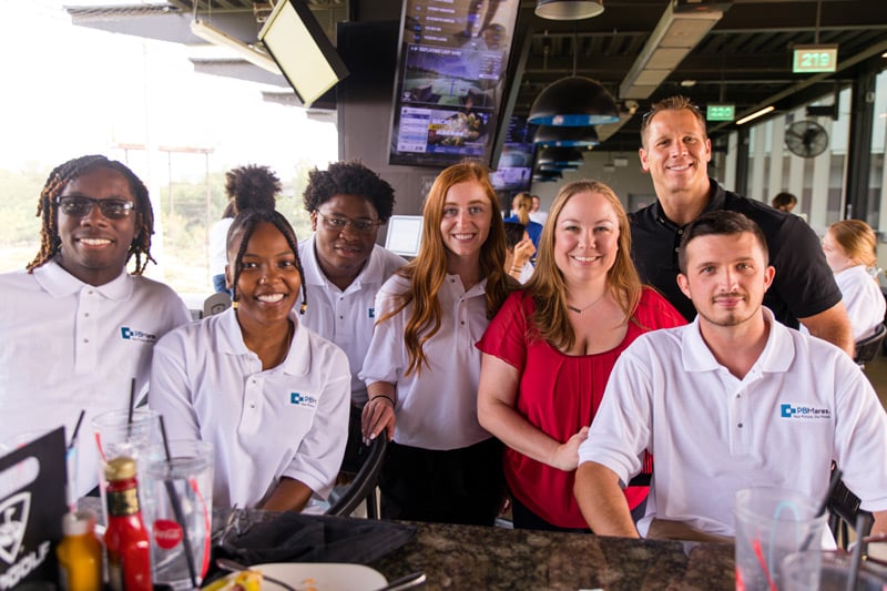 pbmares interns with staff and ceo